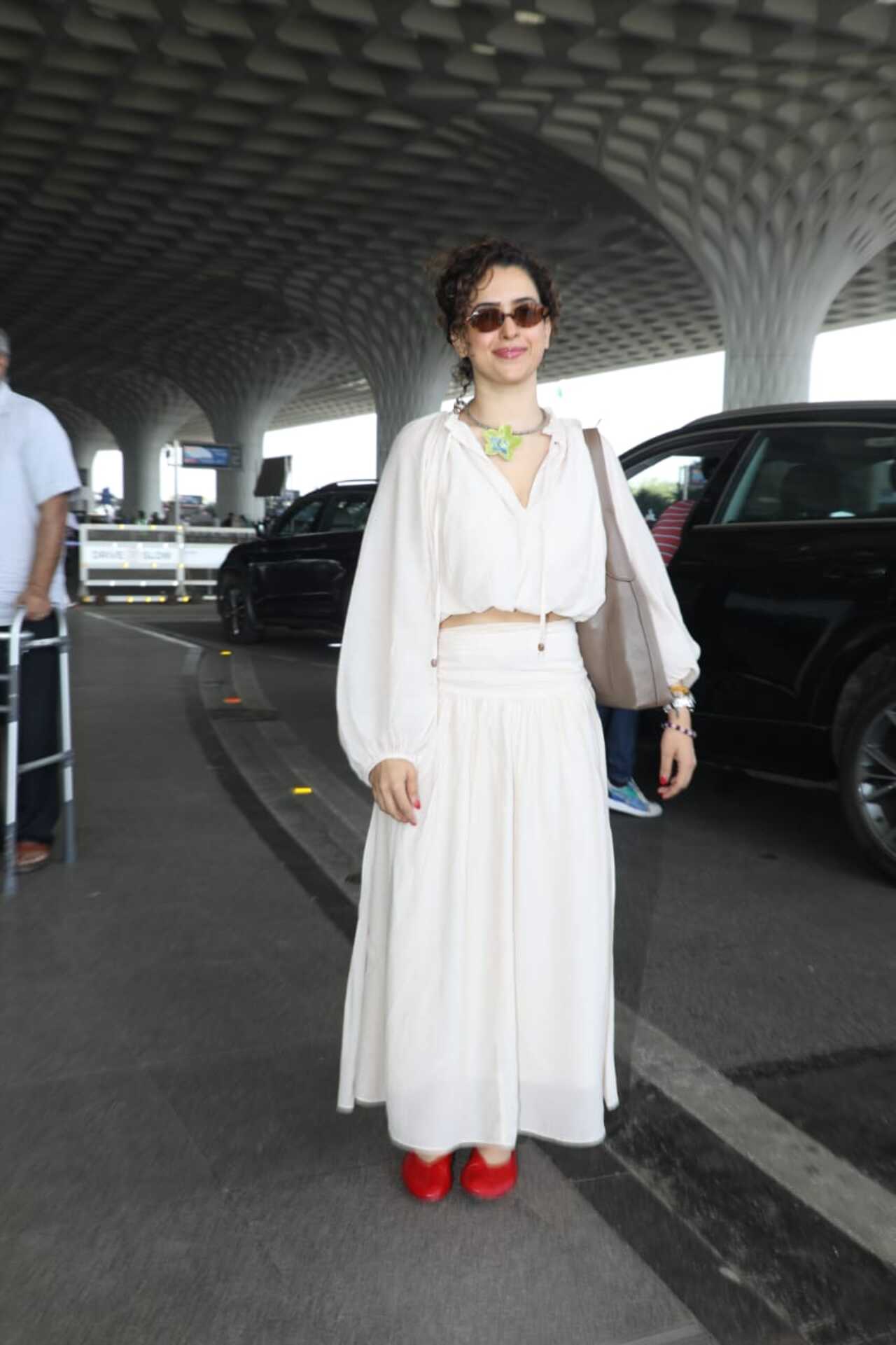 Sanya Malhotra was seen at the airport as she headed out of the city on Sunday morning.